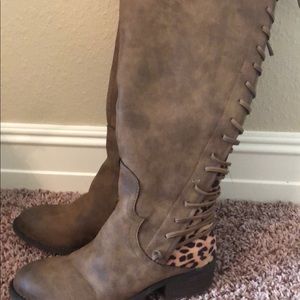 Lace up leopard knee high boots